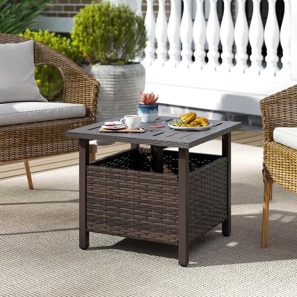 iron patio umbrella stand Sunnydaze 24lb Heavy-Duty Round Cast Base, 18", Black standing near a seating area Treasure Garden 50 lb Classic