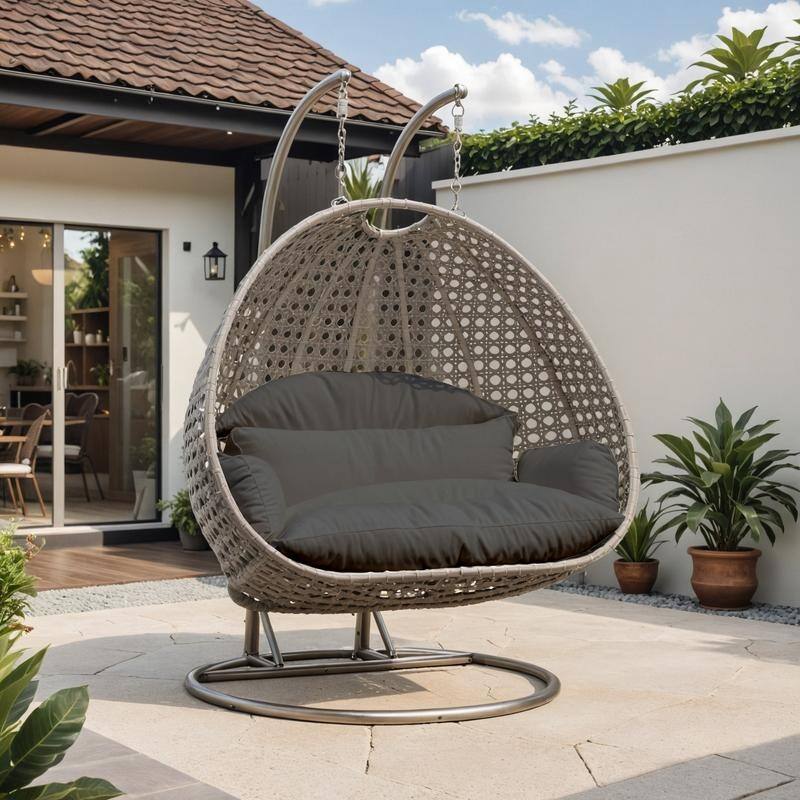 LeisureMod Modern 2-Person Egg Hanging Swing Chair with Beige Wicker, Oxford Fabric Cover, Patio Hammock Lounger and Cushions
