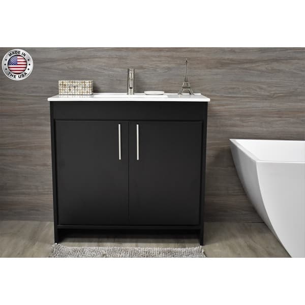 https://ak1.ostkcdn.com/images/products/is/images/direct/c5c24af01a3efd3374a4f9ac15ccd20b42efeab4/Volpa-USA-Villa-36-inch-Freestanding-Bathroom-Vanity-in-Black-Set.jpg?impolicy=medium