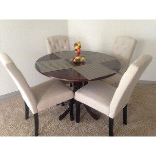 Copper Grove Karl Round Table with Two 9-inch Drop Leaves