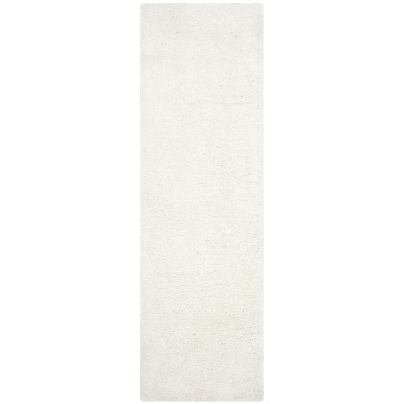SAFAVIEH Handmade South Beach Leonella Shag Solid Polyester Rug