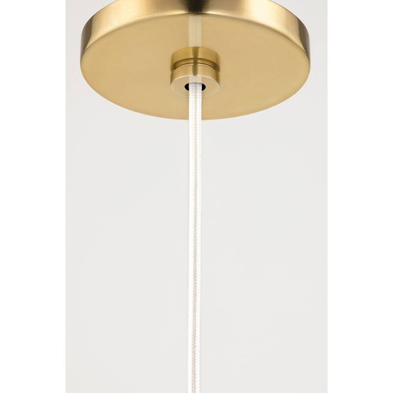 The Curated Nomad Tamarack 1-light Aged Brass Pendant with Clear Glass