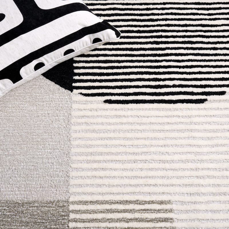 SAFAVIEH Handmade Ebony Liubka Contemporary Wool Rug