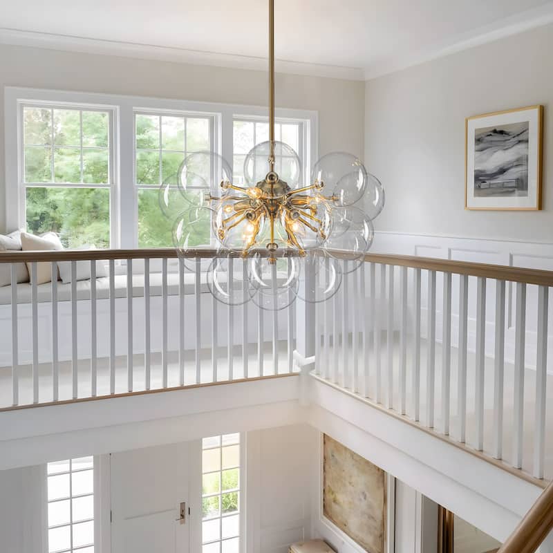 Starsky 12‑Light Linear Chandelier with Clear Glass Globes - Black or Gold Finish