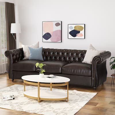 Somerville Chesterfield Tufted Faux Leather Sofa with Scroll Arms by Christopher Knight Home