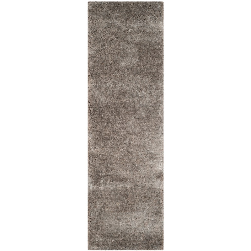 SAFAVIEH Handmade South Beach Leonella Shag Solid Polyester Rug