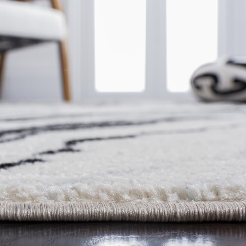 SAFAVIEH Tucson Odessa Machine Washable Traditional Rug