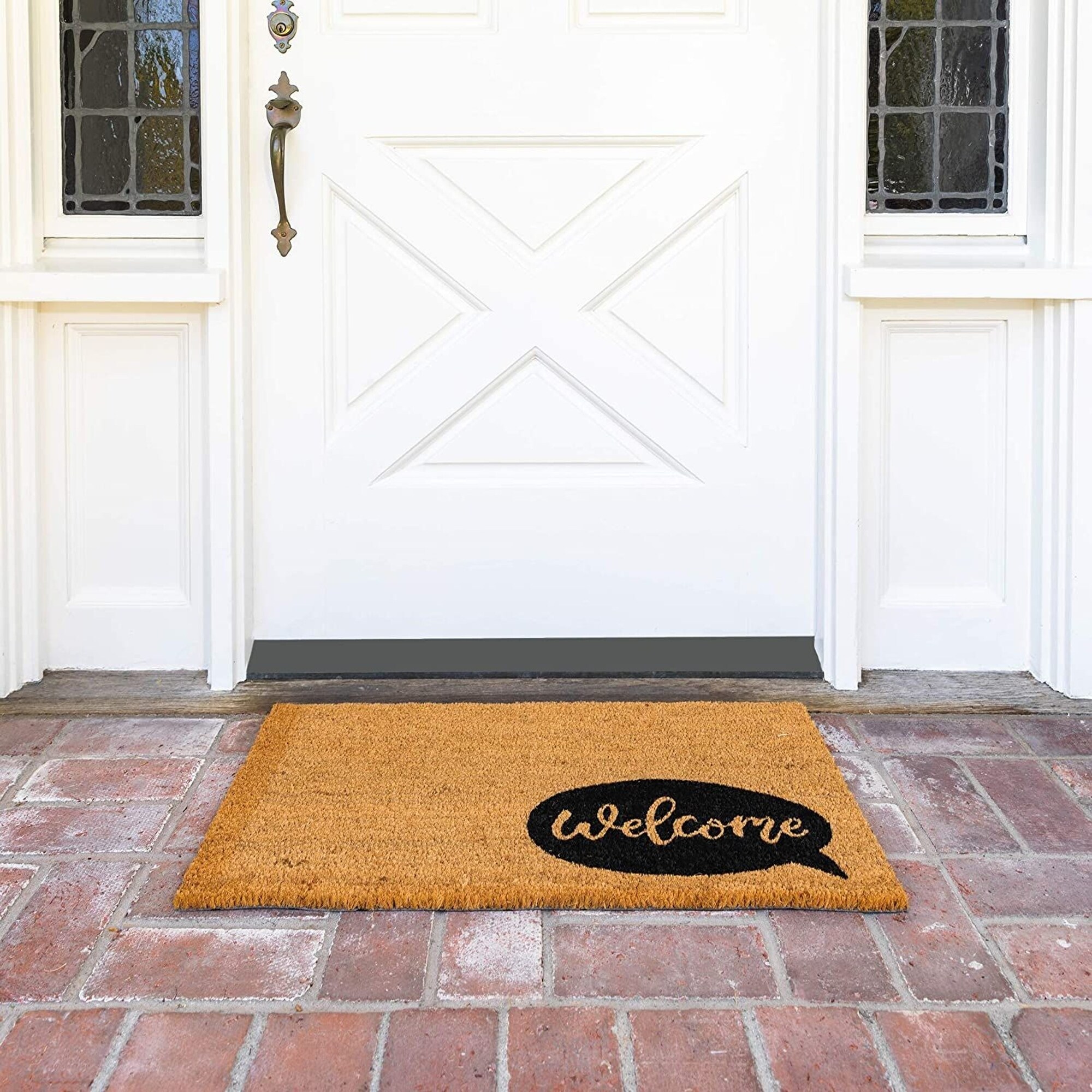 https://ak1.ostkcdn.com/images/products/is/images/direct/c6d0b3f8535ac181752ad56bb7030d9b5980db92/Natural-Coir-Welcome-Doormat-with-Speech-Bubble-%2817-x-30-Inches%29.jpg