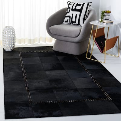 SAFAVIEH Handmade Studio Leather Neli Mid-Century Modern Rug