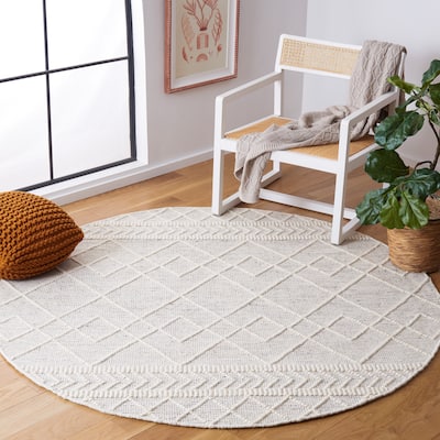 SAFAVIEH Handmade Natura Perunika Wool Braided Tassel Rug