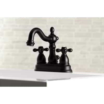 Kingston Brass Heritage Two-Handle 3-Hole Deck Mount 4 in. Centerset Bathroom Faucet