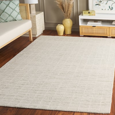SAFAVIEH Handmade Ebony Peigi Contemporary Wool Rug