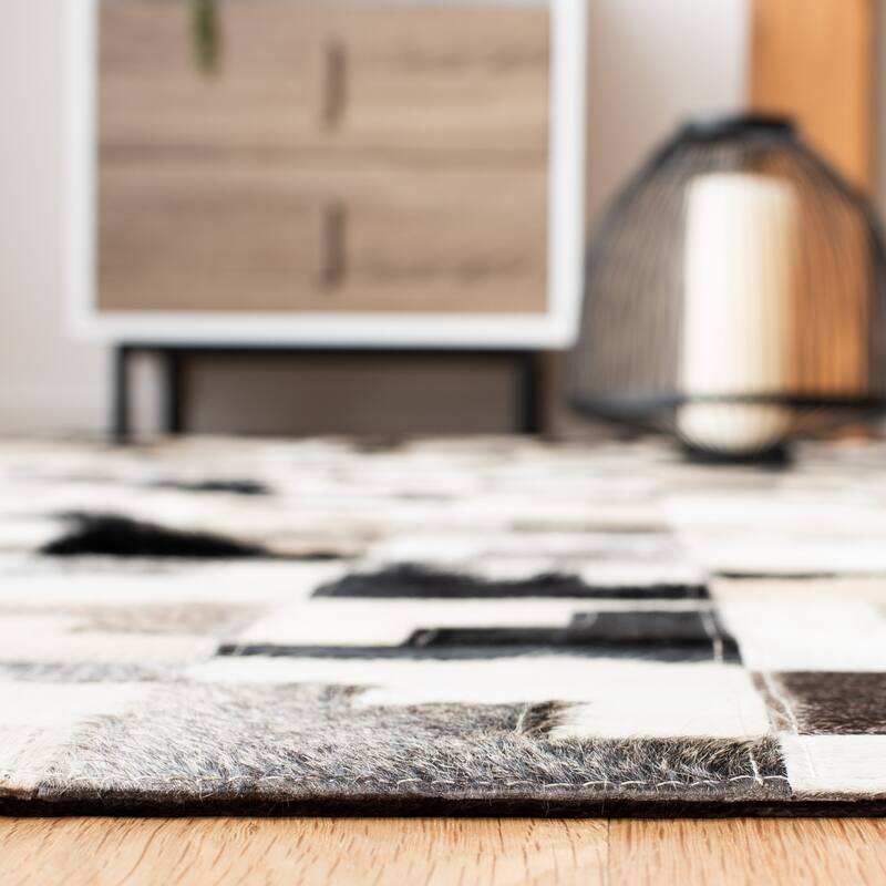 SAFAVIEH Handmade Studio Leather Rengin Modern Leather Rug