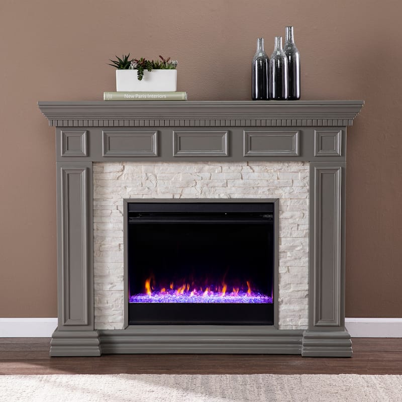 SEI Furniture Derlaro Color Changing Fireplace w/ Faux Stone