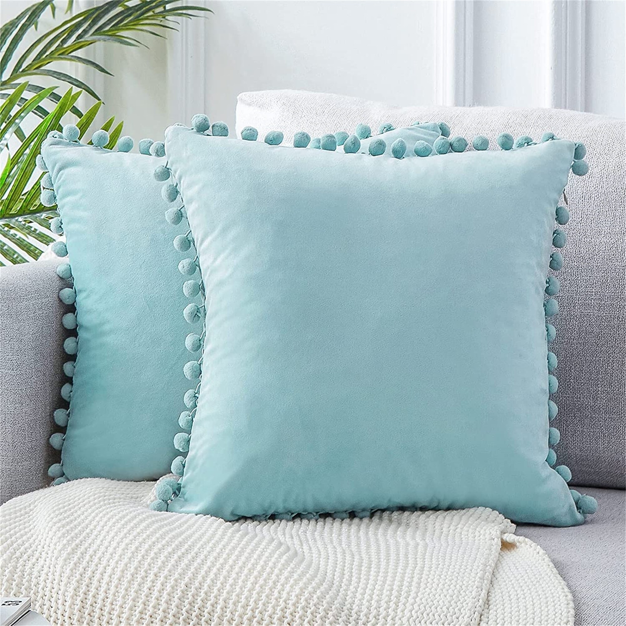 duck egg pom pom cushion