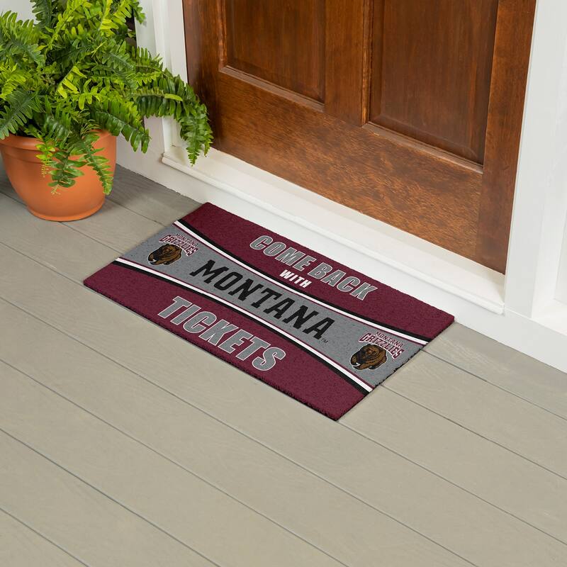 University of Montana 28 in. x 16 in. PVC "Come Back With Tickets" Trapper Door Mat