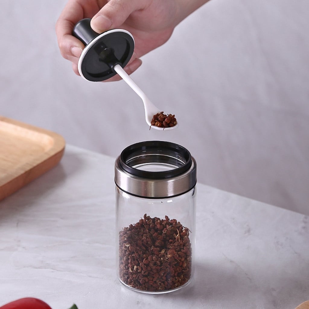 https://ak1.ostkcdn.com/images/products/is/images/direct/c76d84c0639aa1c14e1fb9762cd8f25824f9bd70/Kitchen-Supplies-Glass-Seasoning-Bottle-Salt-Storage-Box-Spice-Jar-With-Spoon.jpg