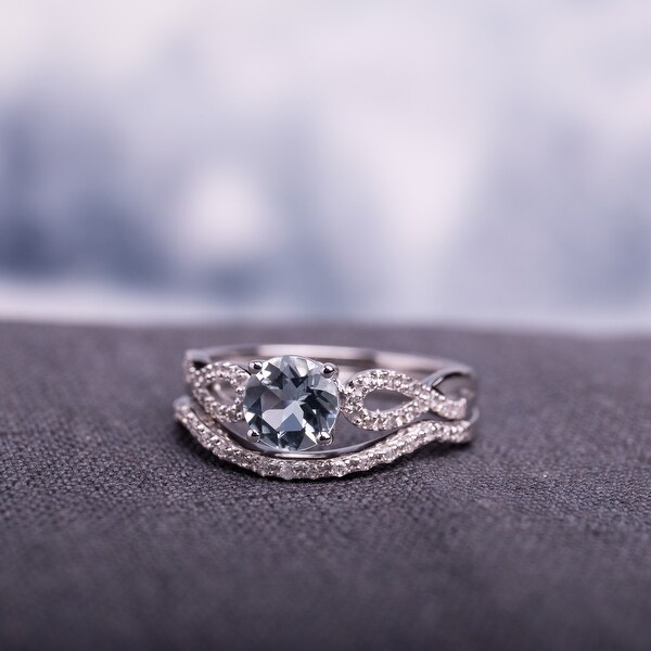 Miadora 10k White Gold Aquamarine and 1/6ct TDW Diamond Bridal Ring Set (G-H, I1-I2) - Blue. Opens flyout.