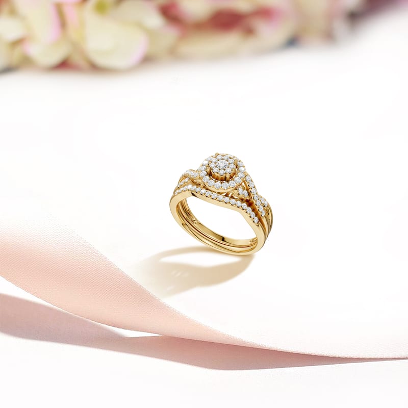 3/8Ct TDW Diamond Halo Twist Shank Bridal Set in 10K Gold for Women