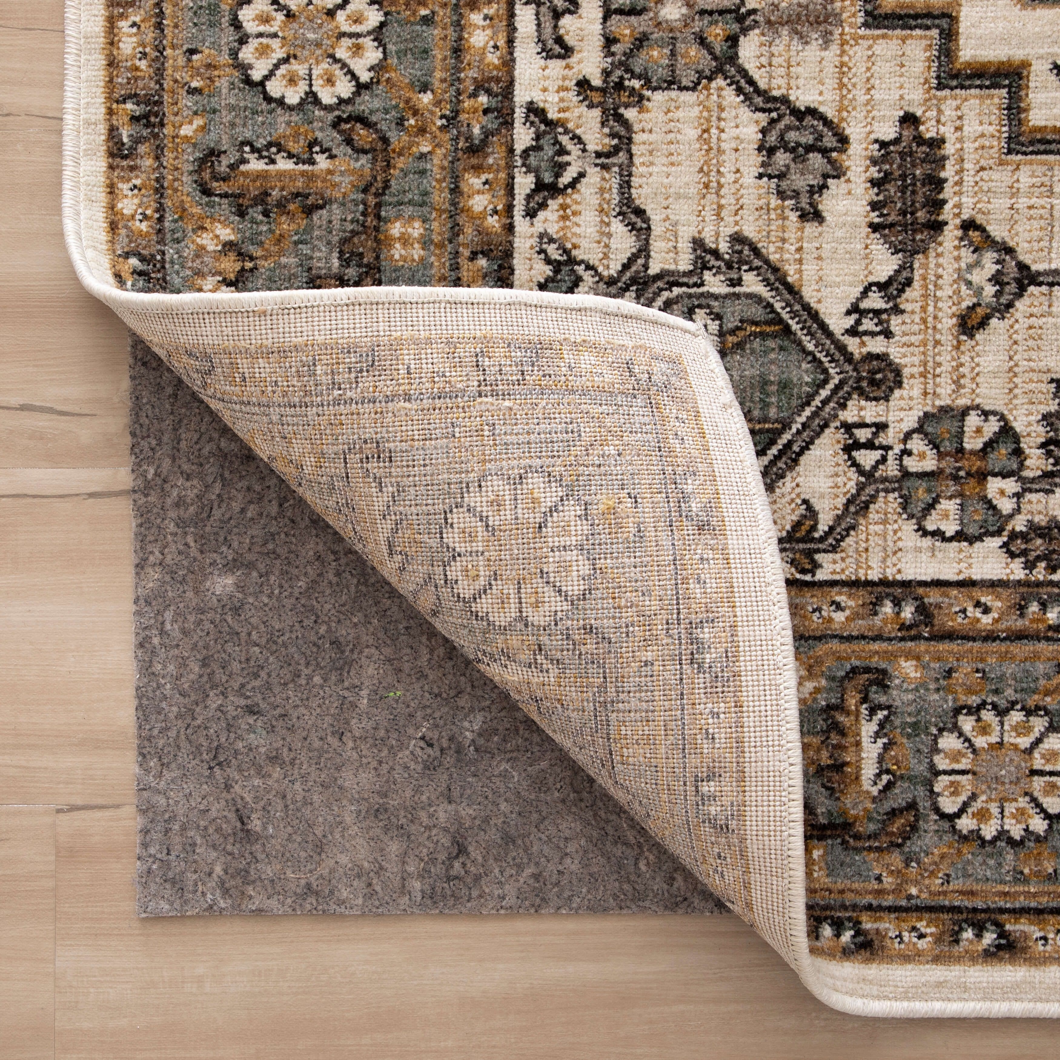 https://ak1.ostkcdn.com/images/products/is/images/direct/c79ffca85e0b1b9987a39d87d0fb00fe2ee135ca/Mohawk-Home-Pet-friendly-Dual-surface-Rug-Pad.jpg