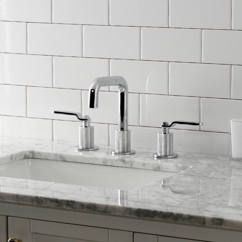 Kingston Brass Whitaker Two-Handle 3-Hole Deck Mount Widespread Bathroom Faucet with Push Pop-Up