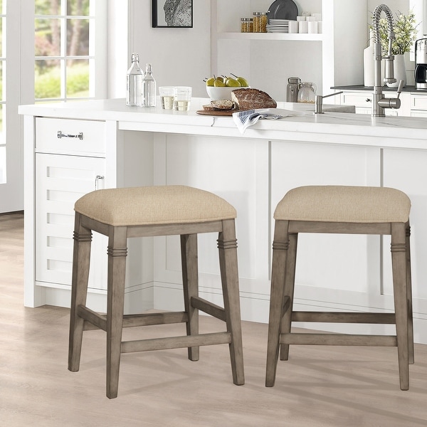 The Gray Barn Chatterly Backless Non-swivel Counter Stool - 18.5"W x 15.75"L x 25.25"H. Opens flyout.