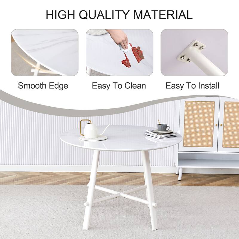A Modern Minimalist Circular Dining Table With A 42 Inch Diameter White Patterned Tabletop And White Metal Legs