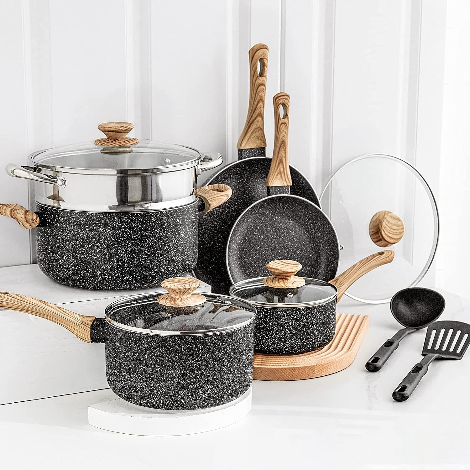 https://ak1.ostkcdn.com/images/products/is/images/direct/c82d1187eaaf0303433293baa96682444b279279/White-Pots-and-Pans-Set-Nonstick-Cookware-Sets%2C-12pcs-White-Granite-Cookware-Set-Induction-Compatible.jpg