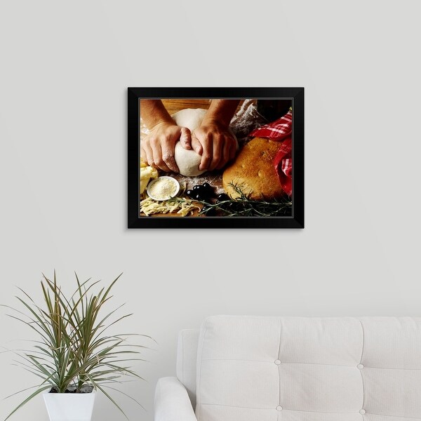 "Kneading dough for italian bread" Black Framed Print