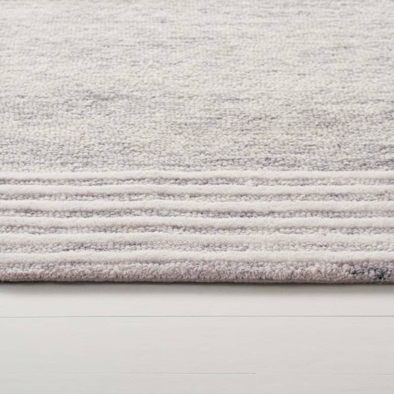 SAFAVIEH Hand-Tufted Lauren Ralph Lauren Sanna Traditional Wool Rug.