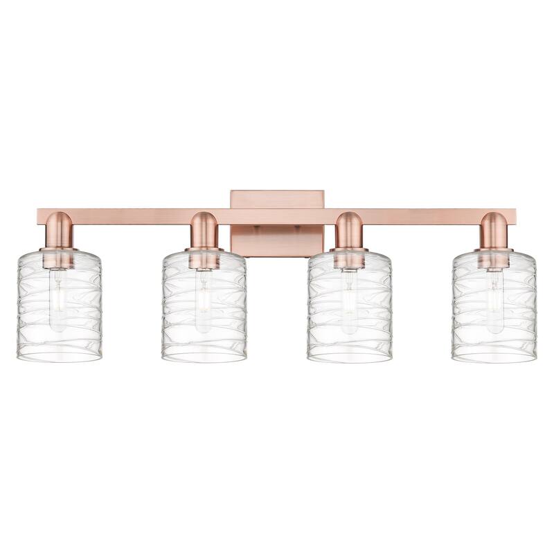 Innovations Lighting Endless Possibilities Arcadia - Cobbleskill - 4 Light 32" Bath Vanity Light - Deco Swirl/Antique Copper