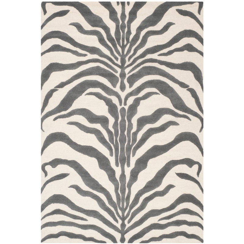 SAFAVIEH Handmade Cambridge Rikey Animal Print Wool Rug - 6' x 9' - Ivory/Dark Grey