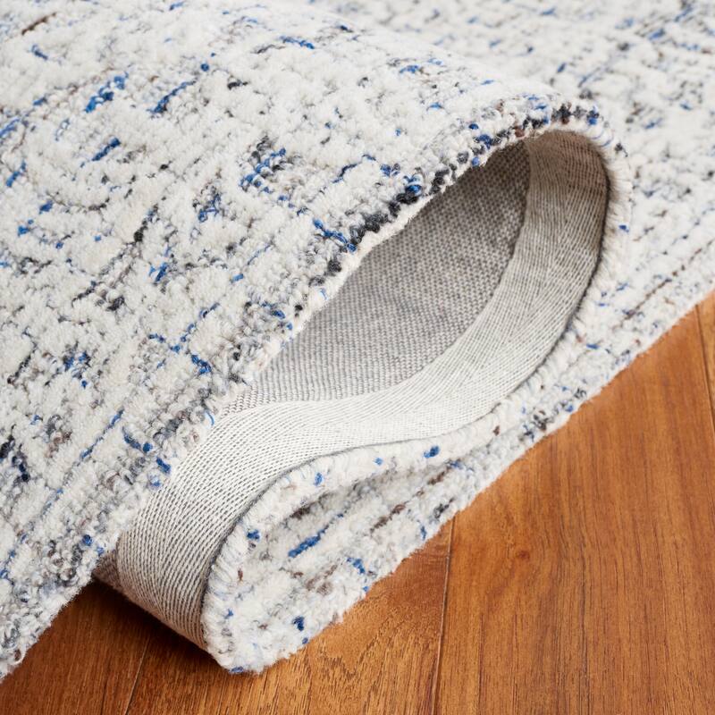 SAFAVIEH Handmade Ebony Pavlinka Modern Wool Rug