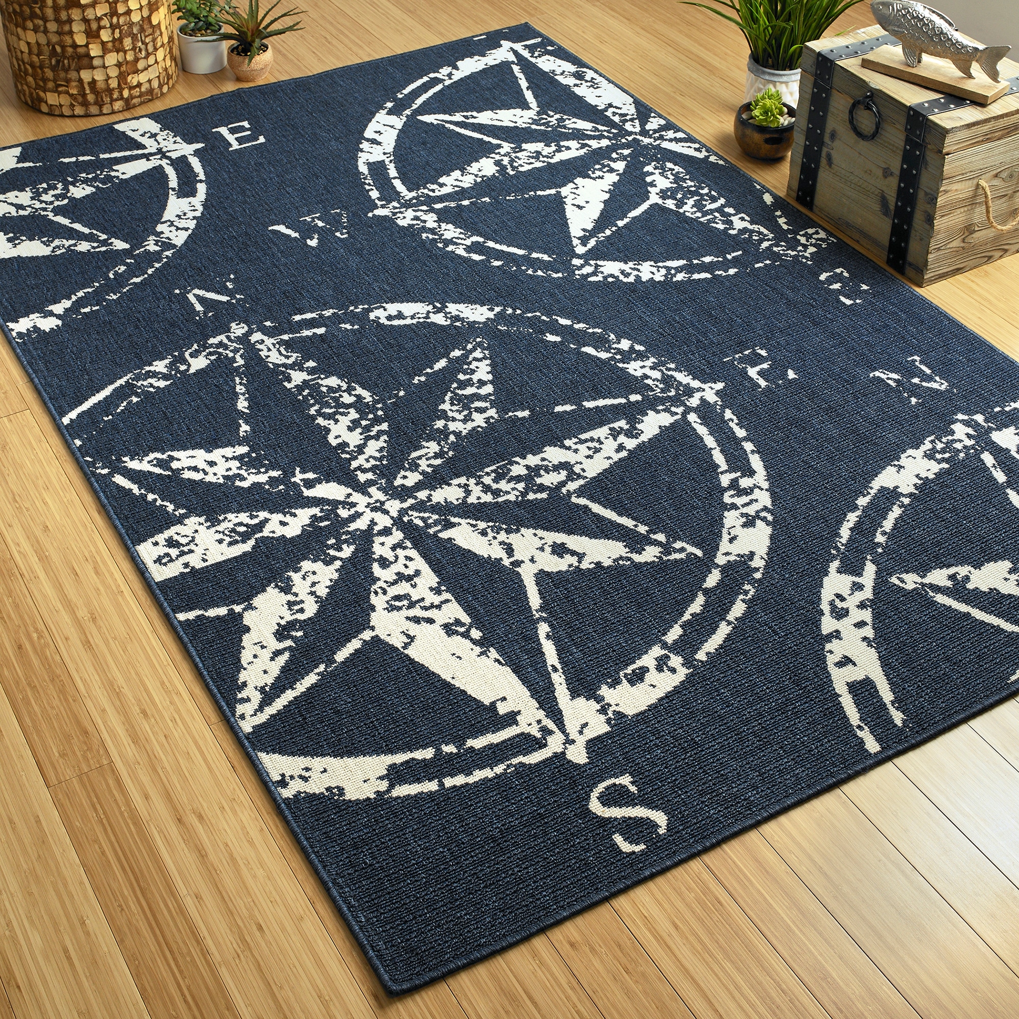 https://ak1.ostkcdn.com/images/products/is/images/direct/c8f8259b2ee40f6799c7c29525a787d73eaa9513/Amalie-Nautical-Star-Compass-Indoor--Outdoor-Area-Rug.jpg