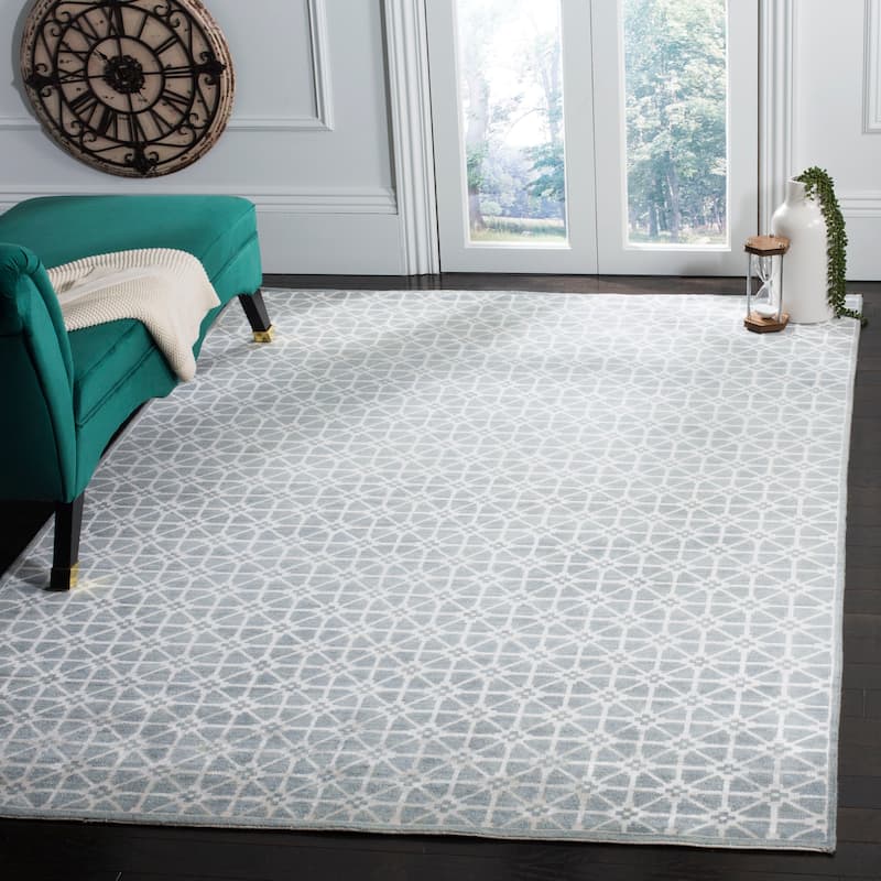 SAFAVIEH Couture Hand-knotted Kensington Lyne Modern Wool Rug - 9' x 12' - Blue