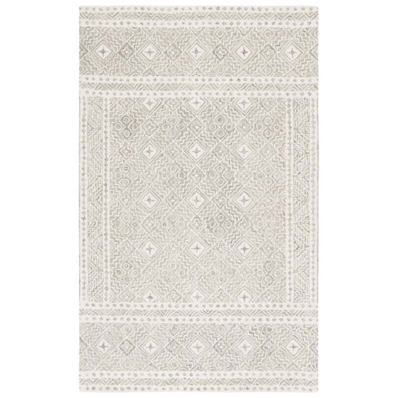 SAFAVIEH Handmade Micro-Loop Jelske Wool Rug