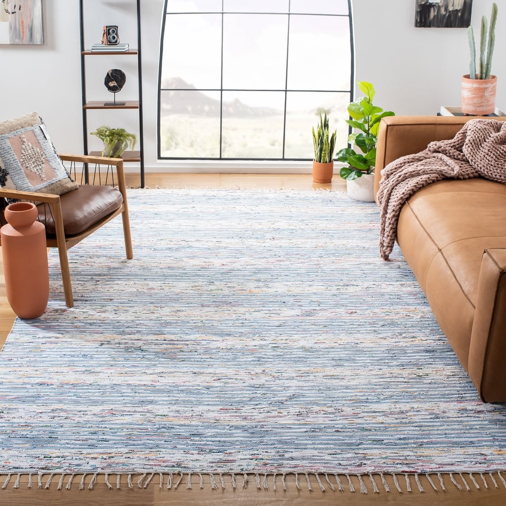 SAFAVIEH Handmade Montauk Miranta Fringe Rug
