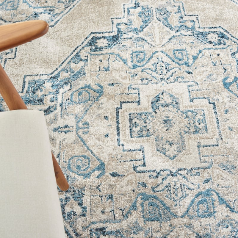 Nourison Geneva Traditional Bordered Area Rug.