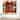 Designart 'Red Facade of Charming Shop In Paris I' French Country Metal Wall Clock