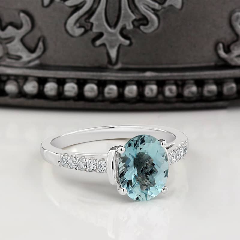 Auriya 2ct Fancy Oval Swiss Blue Topaz and Diamond Engagement Ring 1/6ctw 14k Gold