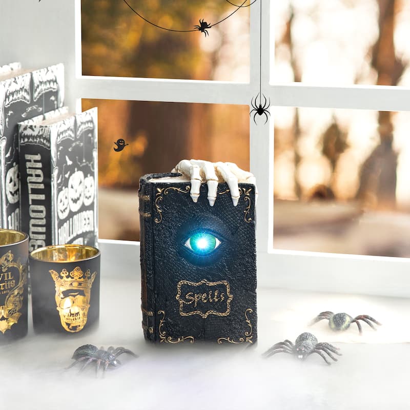 Glitzhome 7.75"H Halloween Lighted Ghostbuster Resin Book - Lighted Ghostbuster