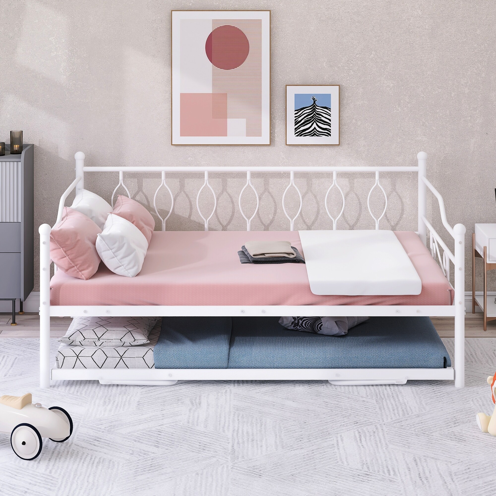 White metal twin shop bed with trundle