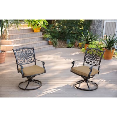 Hanover Traditions 7-Piece Dining Set in Tan with a 60 In. Round Cast-top Table and Six Swivel Rockers