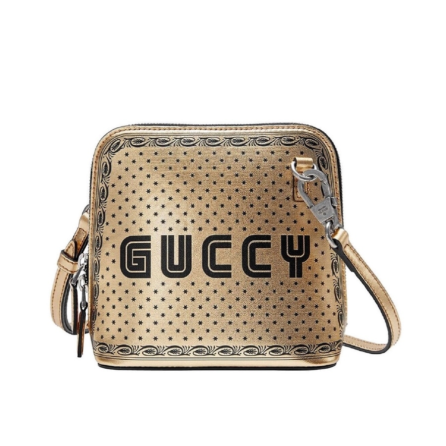 gold gucci purse