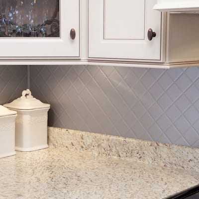 Fasade Quilted Decorative Vinyl 18in x 24in Backsplash Panel in Argent Silver