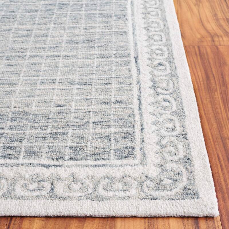 SAFAVIEH Handmade Ebony Rikie Modern & Contemporary Wool Rug