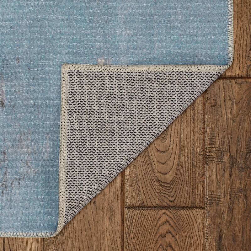Kyler Machine Washable Beige and Blue Watercolor Area Rug