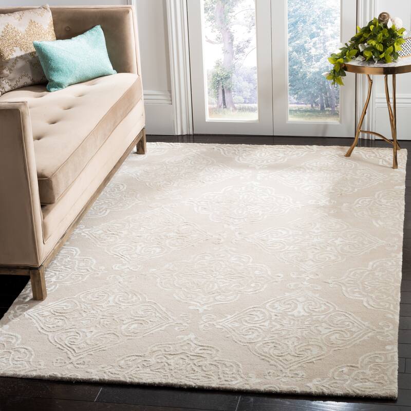 SAFAVIEH Handmade Glamour Graca Modern Viscose Rug - 5' x 8' - Beige/Ivory