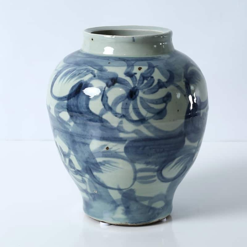 Approx. 10" High Blue and White Jar with Flower Motif