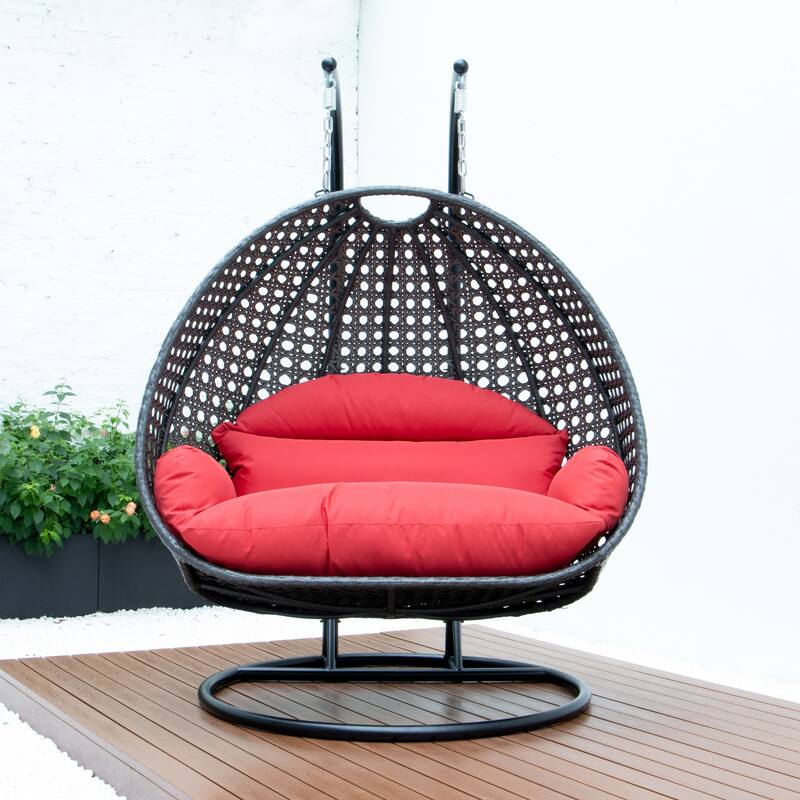 LeisureMod 2-Person Hanging Egg Swing Chair with Metal Stand - Handcrafted Charcoal Wicker, Patio Hammock Lounger with Cushions